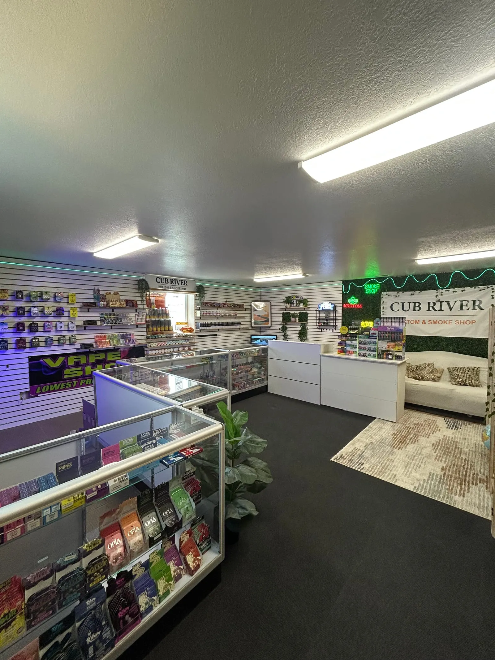 Glass display cases at Cub River holding nicotine pouches and accessories